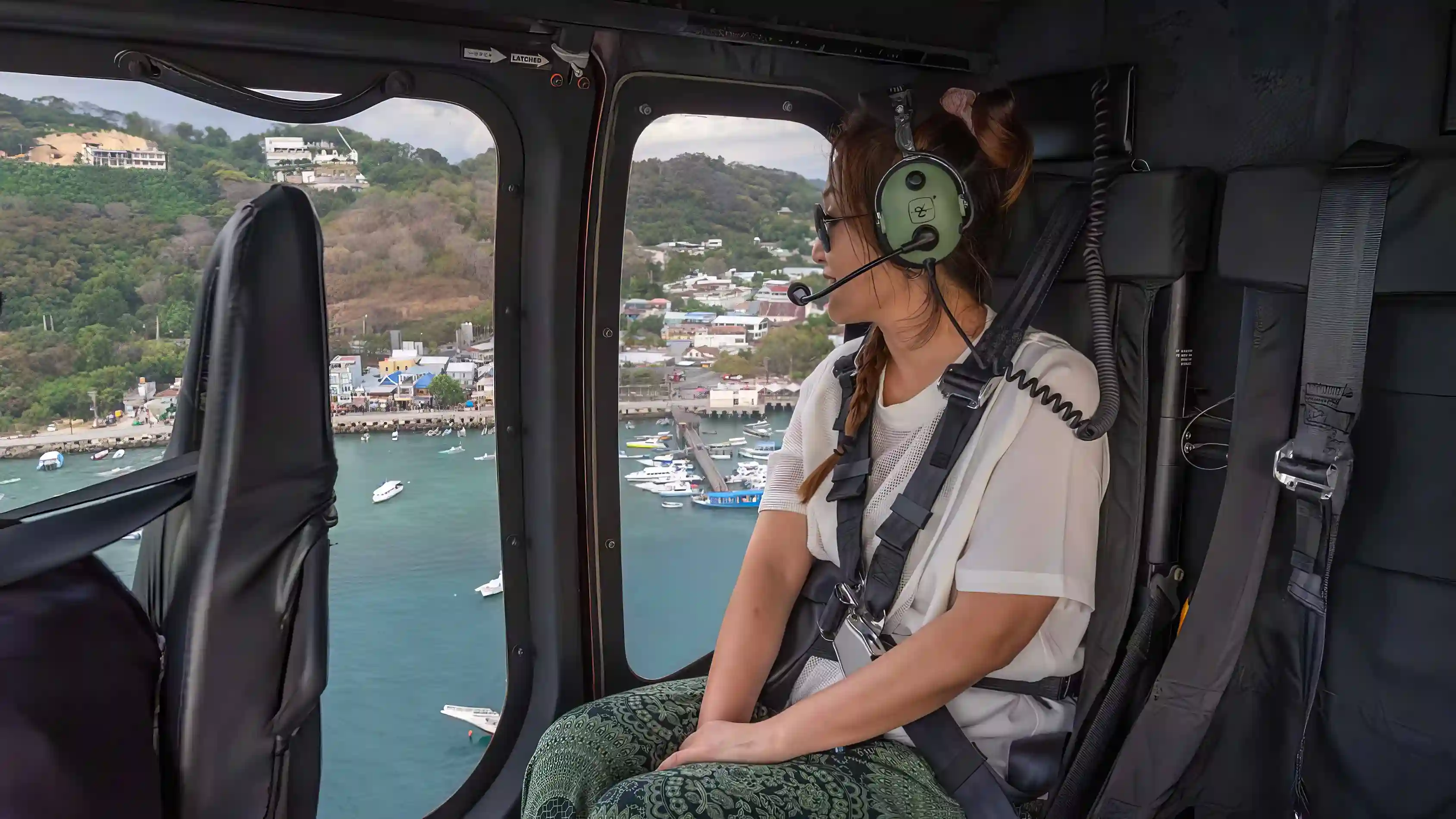 Scenic helicopter flight over Padar Island and Pink Beach